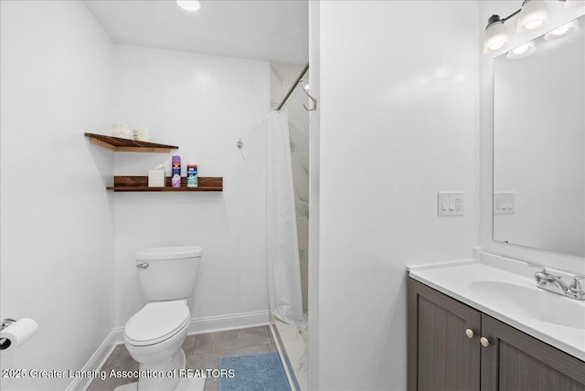 5195 E Brookfield Dr, East Lansing, MI 48823 - full bath featuring toilet, vanity, and baseboards