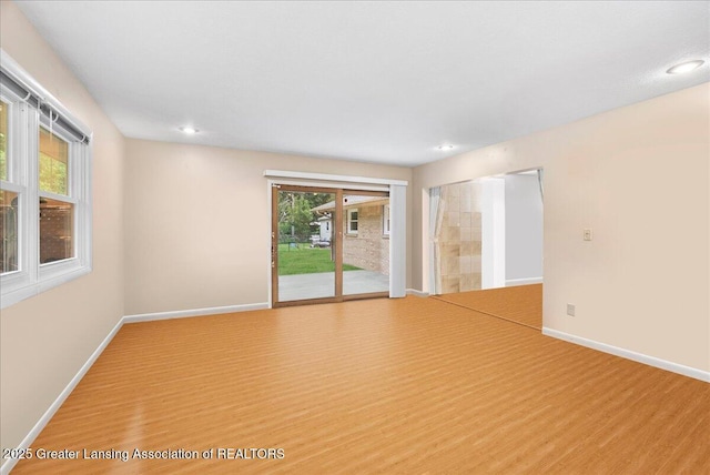 5195 E Brookfield Dr, East Lansing, MI 48823 - empty room featuring baseboards, recessed lighting, and light wood finished floors