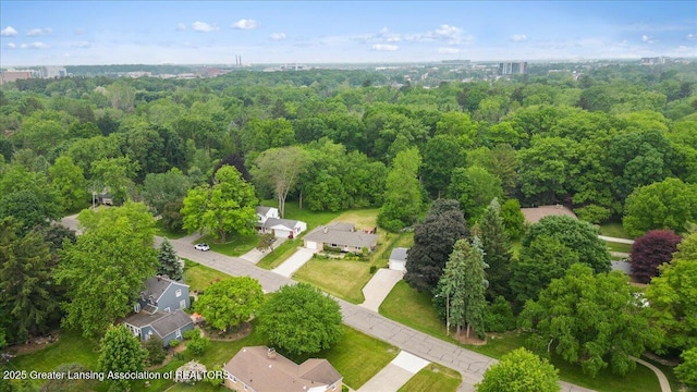 5195 E Brookfield Dr, East Lansing, MI 48823 - aerial overview of property's location with a heavily wooded area