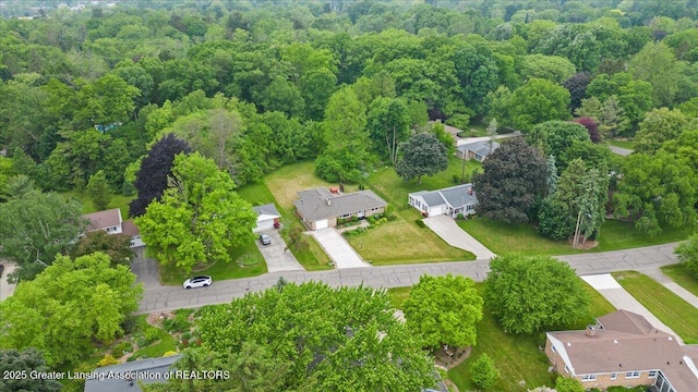 5195 E Brookfield Dr, East Lansing, MI 48823 - aerial overview of property's location with a forest
