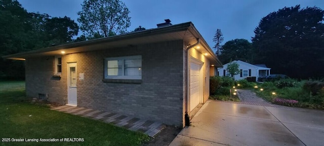 5195 E Brookfield Dr, East Lansing, MI 48823 - view of front of home featuring an attached garage