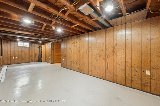 1718 Victor Ave, Lansing, MI 48910 - basement featuring wood walls