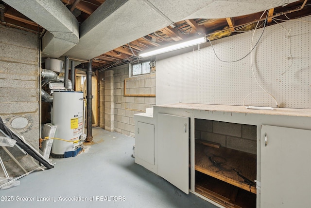 1718 Victor Ave, Lansing, MI 48910 - below grade area with water heater and a workshop area