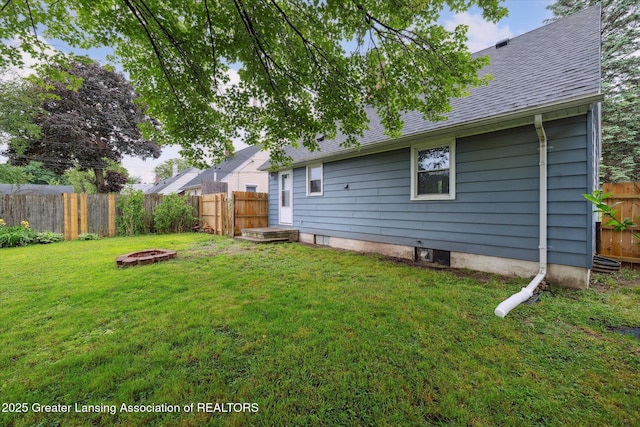 1718 Victor Ave, Lansing, MI 48910 - view of yard with an outdoor fire pit