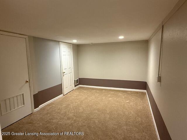 6328 Beechfield Dr, Lansing, MI 48911 - unfurnished room with carpet flooring and recessed lighting