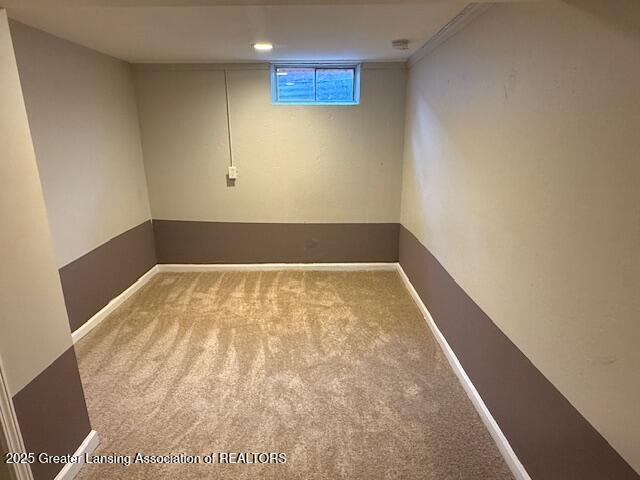 6328 Beechfield Dr, Lansing, MI 48911 - below grade area featuring carpet flooring and baseboards