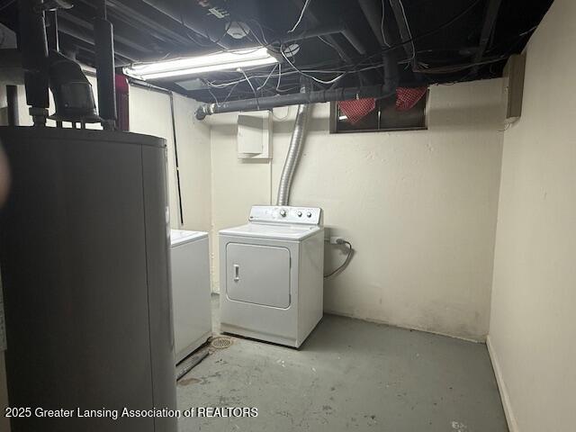 6328 Beechfield Dr, Lansing, MI 48911 - laundry area featuring separate washer and dryer