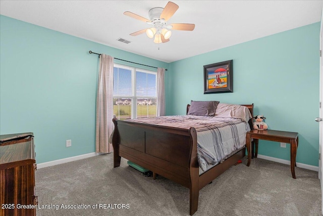 12947 Townsend Dr Unit 412, Grand Ledge, MI 48837 - carpeted bedroom featuring baseboards and ceiling fan