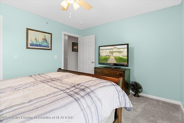 12947 Townsend Dr Unit 412, Grand Ledge, MI 48837 - carpeted bedroom featuring baseboards and a ceiling fan