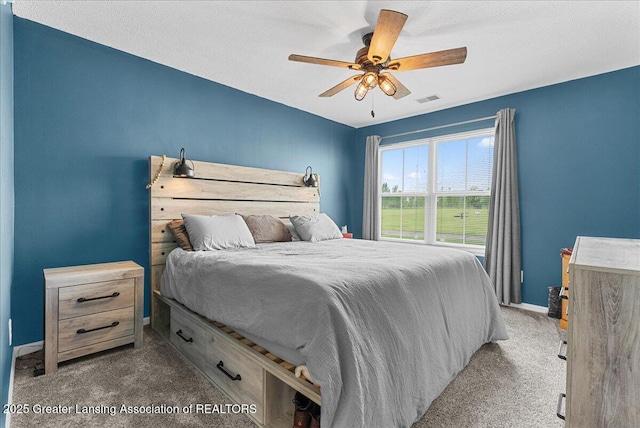 12947 Townsend Dr Unit 412, Grand Ledge, MI 48837 - bedroom with carpet floors, baseboards, and ceiling fan