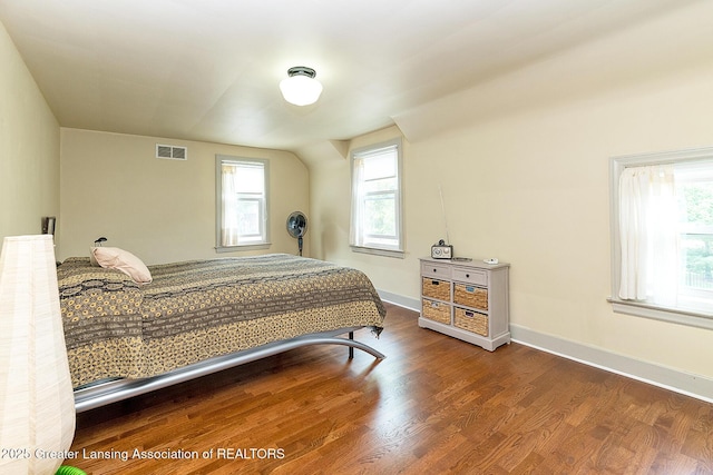 544 Collingwood Dr, East Lansing, MI 48823 - bedroom featuring wood finished floors and baseboards