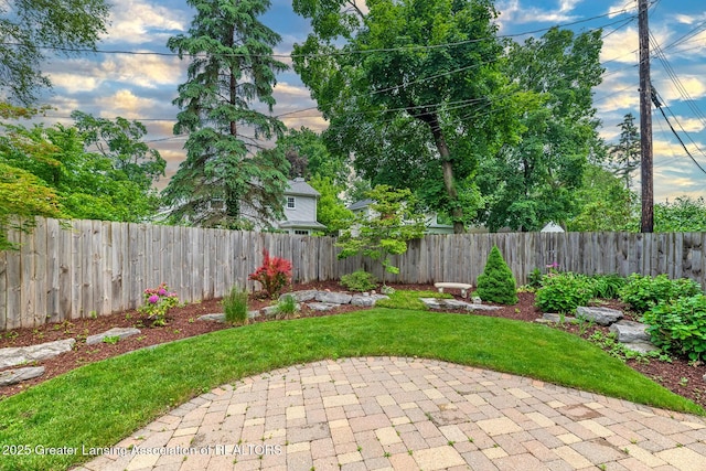 544 Collingwood Dr, East Lansing, MI 48823 - fenced backyard featuring a patio