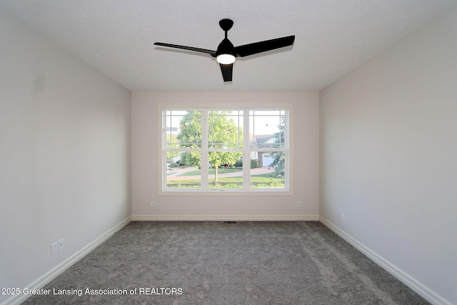 623 Aquila Dr, East Lansing, MI 48823 - unfurnished room with a ceiling fan, carpet, and baseboards