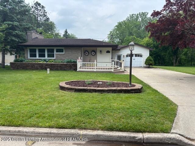 505 W Washington St, Dewitt, MI 48820 - ranch-style home with concrete driveway, a front lawn, and a chimney