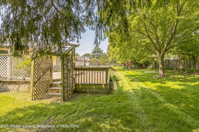 1802 Rockdale Ave, Lansing, MI 48917 - view of yard featuring a wooden deck