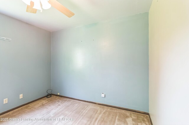 1802 Rockdale Ave, Lansing, MI 48917 - carpeted empty room featuring a ceiling fan and baseboards