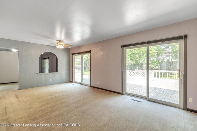 1802 Rockdale Ave, Lansing, MI 48917 - carpeted spare room with ceiling fan and baseboards