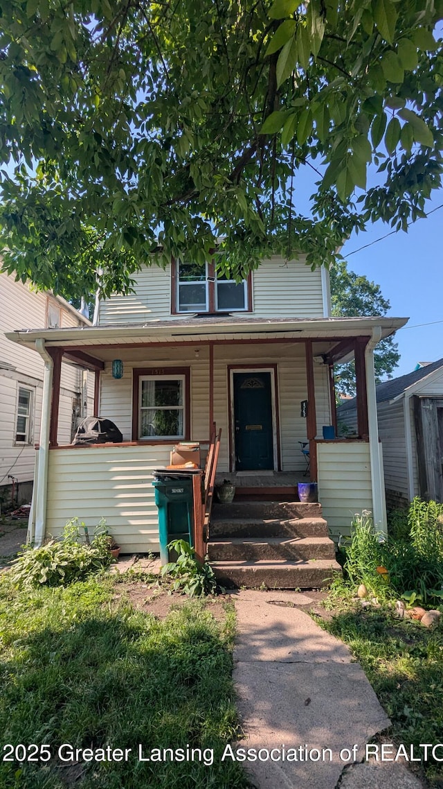 1515 Prospect St, Lansing, MI 48912 - view of front of property with a porch