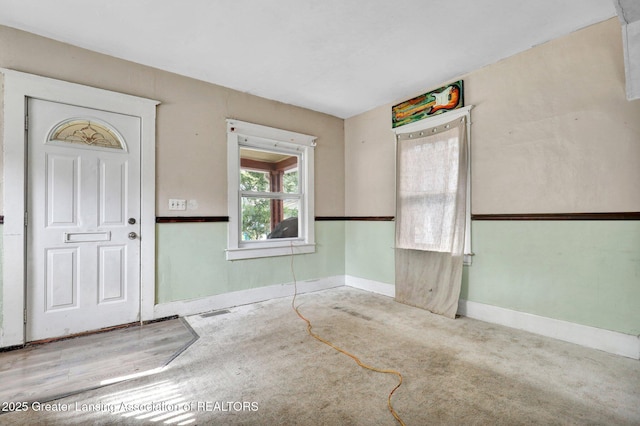 1515 Prospect St, Lansing, MI 48912 - carpeted foyer entrance featuring baseboards
