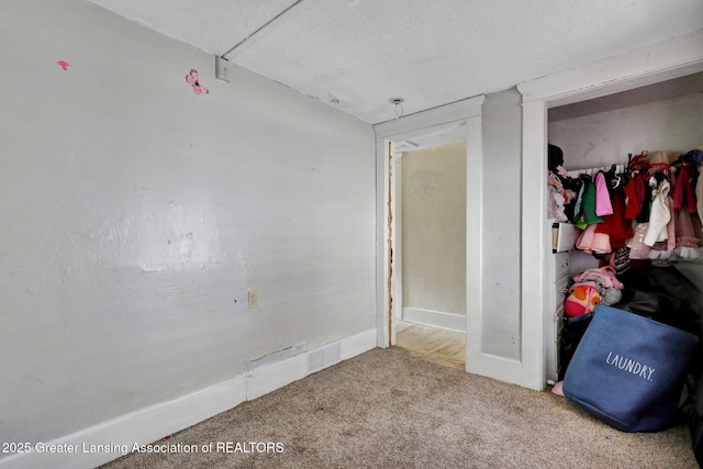 1515 Prospect St, Lansing, MI 48912 - unfurnished bedroom with carpet and a closet