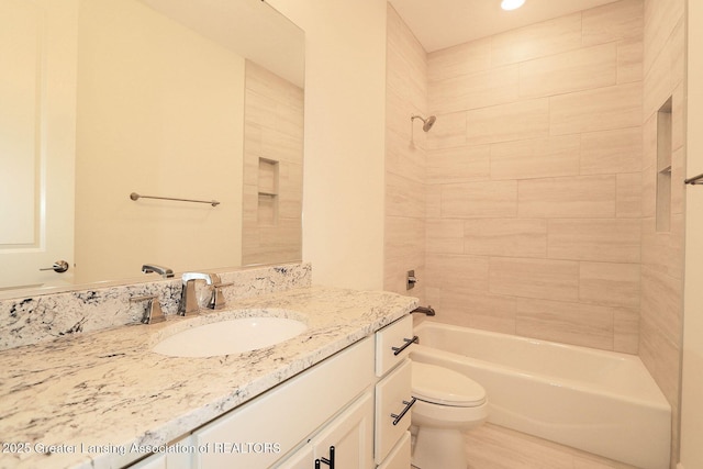 629 Aquila Dr, East Lansing, MI 48823 - bathroom featuring vanity, toilet, shower / washtub combination, and recessed lighting