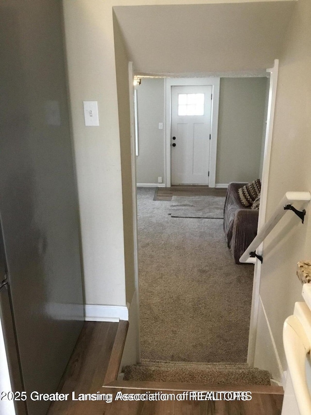 4615 Hughes Rd, Lansing, MI 48910 - carpeted entrance foyer with baseboards