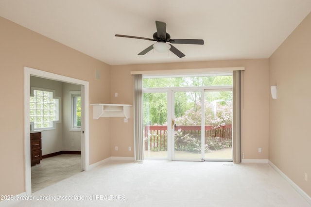 1120 Nautical Dr, Okemos, MI 48864 - spare room featuring ceiling fan, carpet flooring, and baseboards