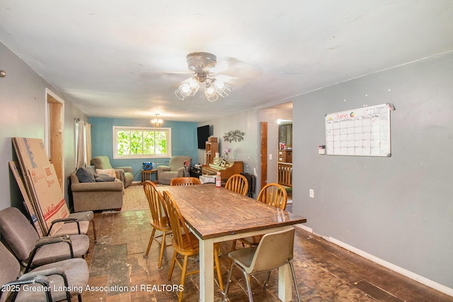 3770 E Frost Rd, Webberville, MI 48892 - dining area featuring ceiling fan and baseboards