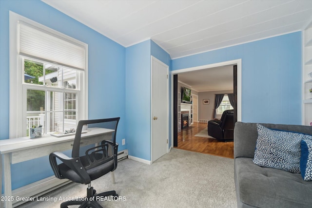 942 W Grand River Ave, East Lansing, MI 48823 - office area with a warm lit fireplace and carpet floors