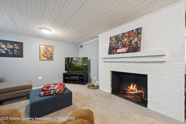 942 W Grand River Ave, East Lansing, MI 48823 - living room featuring a brick fireplace, carpet, and wood ceiling