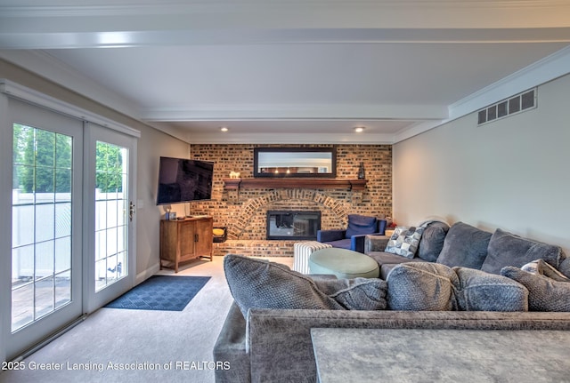 6108 Skyline Dr, East Lansing, MI 48823 - carpeted living room with a fireplace, crown molding, brick wall, and beamed ceiling