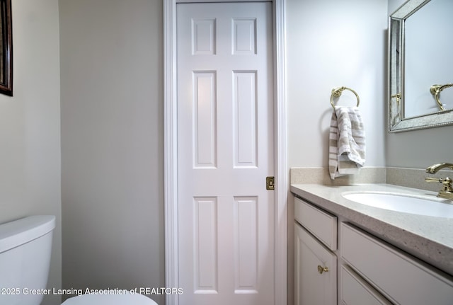 6108 Skyline Dr, East Lansing, MI 48823 - half bathroom with toilet and vanity