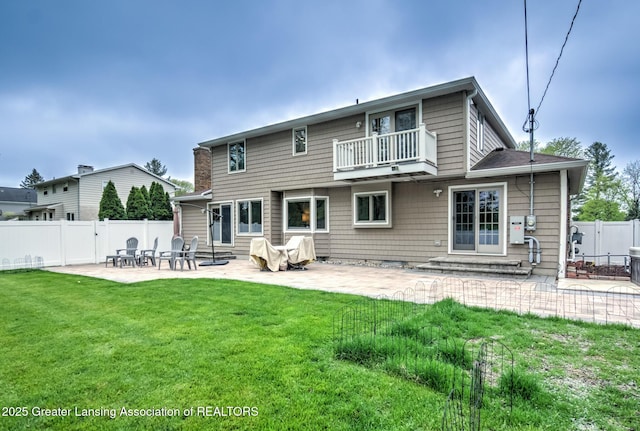 6108 Skyline Dr, East Lansing, MI 48823 - rear view of property with a balcony, a patio, and entry steps