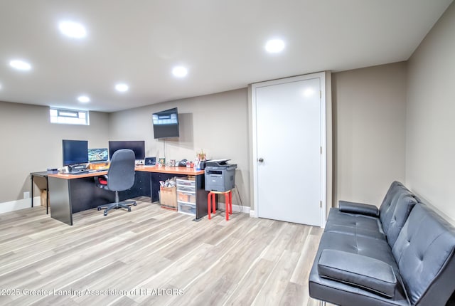6108 Skyline Dr, East Lansing, MI 48823 - home office featuring light wood-style flooring, recessed lighting, and baseboards