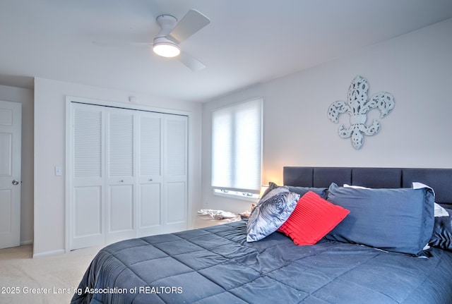 6108 Skyline Dr, East Lansing, MI 48823 - carpeted bedroom with a closet and a ceiling fan