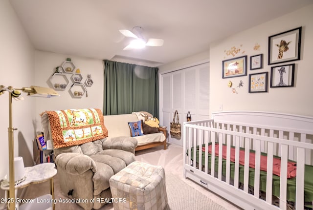 6108 Skyline Dr, East Lansing, MI 48823 - carpeted bedroom with a closet and ceiling fan