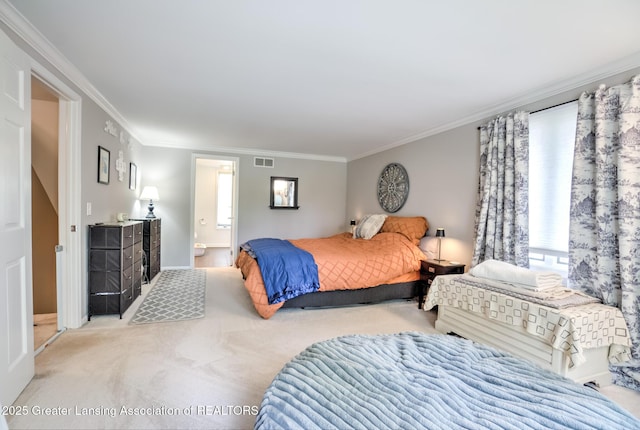 6108 Skyline Dr, East Lansing, MI 48823 - carpeted bedroom with multiple windows, ornamental molding, connected bathroom, and baseboards