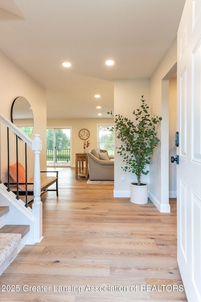 5871 Green Rd, Haslett, MI 48840 - entrance foyer with light wood finished floors, stairs, and recessed lighting
