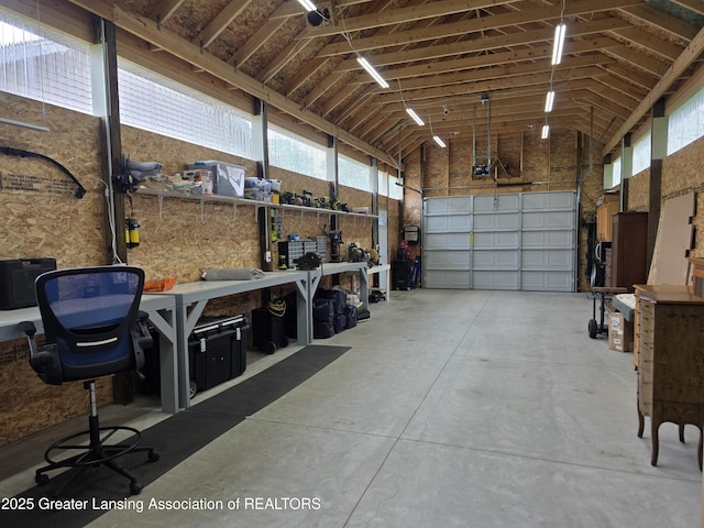 2380 S Waverly Rd, Eaton Rapids, MI 48827 - garage with a workshop area