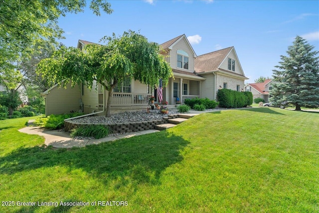 2134 Cedar Bend Dr, Holt, MI 48842 - view of property hidden behind natural elements featuring a porch and a front yard
