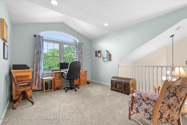 2134 Cedar Bend Dr, Holt, MI 48842 - carpeted office space featuring vaulted ceiling and baseboards
