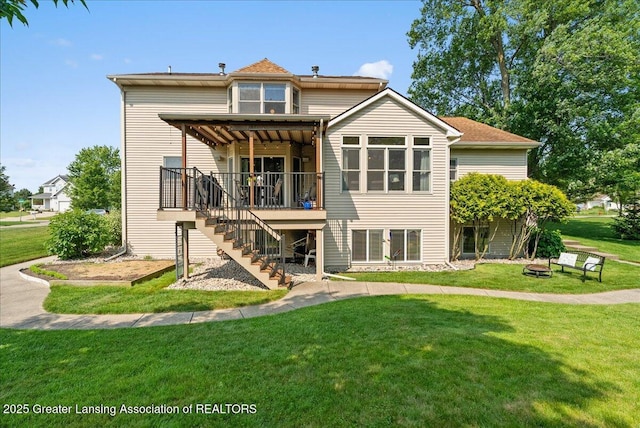 2134 Cedar Bend Dr, Holt, MI 48842 - rear view of property featuring stairs, a deck, a lawn, and a fire pit