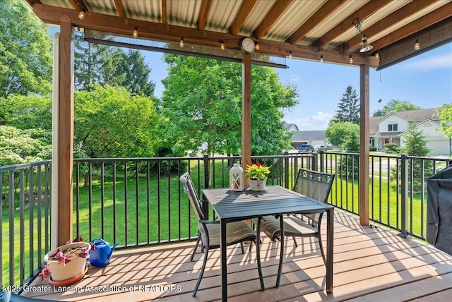 2134 Cedar Bend Dr, Holt, MI 48842 - wooden deck featuring a lawn and outdoor dining space