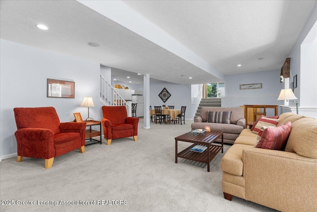 2134 Cedar Bend Dr, Holt, MI 48842 - living room with stairs, light colored carpet, recessed lighting, and a textured ceiling