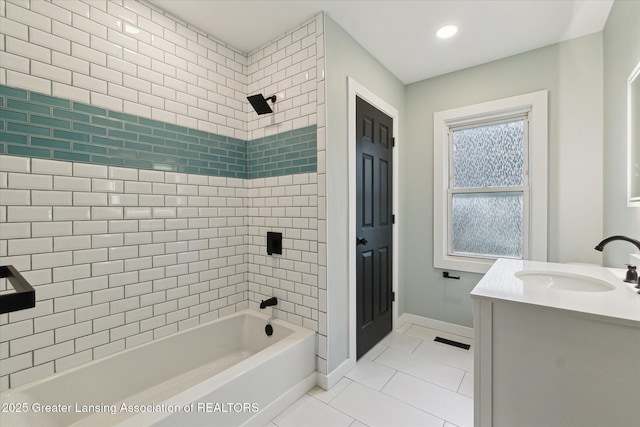 2506 W Kalamazoo St, Lansing, MI 48917 - bathroom with shower / washtub combination, tile patterned floors, vanity, baseboards, and recessed lighting