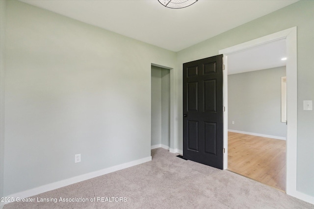 2506 W Kalamazoo St, Lansing, MI 48917 - unfurnished bedroom with carpet floors and baseboards