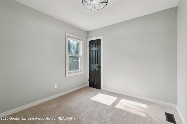 2506 W Kalamazoo St, Lansing, MI 48917 - empty room with carpet and baseboards