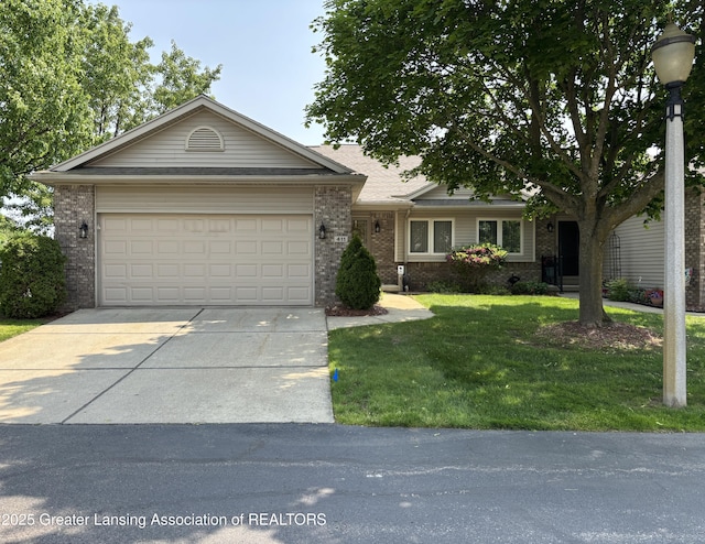 411 White Pine Blvd Unit 34, Lansing, MI 48917 - ranch-style house featuring brick siding, driveway, a garage, and a front yard