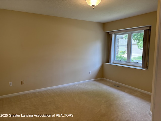 411 White Pine Blvd Unit 34, Lansing, MI 48917 - unfurnished room with light carpet
