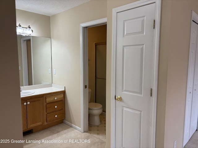 411 White Pine Blvd Unit 34, Lansing, MI 48917 - bathroom with vanity and toilet